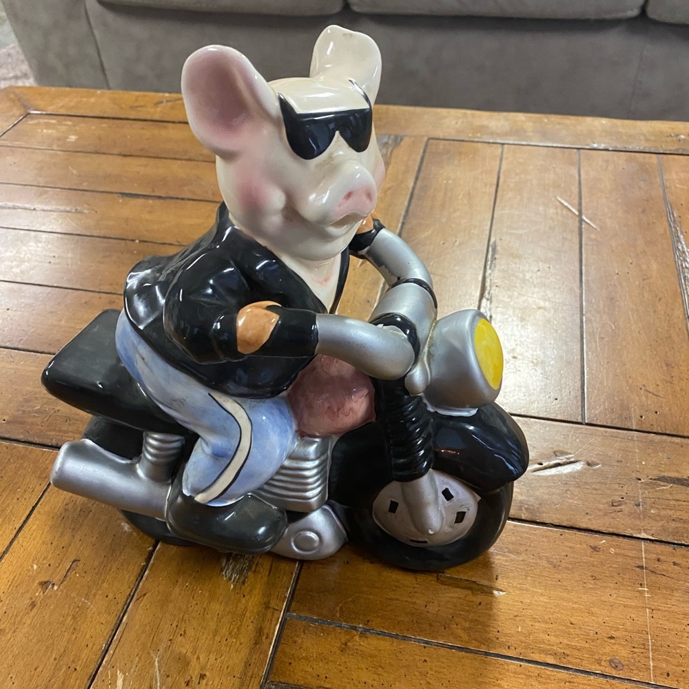 Pig on a motorcycle piggy bank!